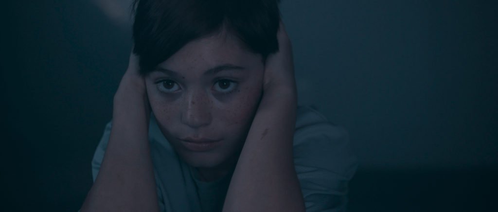 Young John Covering Ears